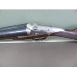 Darne 12 bore double barrel sid by side shotgun no. 8B 758. Barrels 27.5 ins., walnut stock.