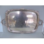 Edwardian heavy silver tea tray of oval form with decoration of shell, C scroll and gadrooned border