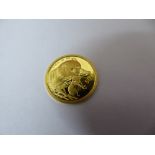 1/10 oz gold proof Chinese Panda coin