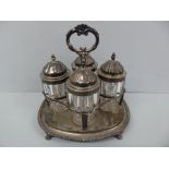 GIII silver cruet with four later bottles - London 1819 - 28 ozt - maker John Foligno, bottles