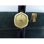 Audemars Piguet ladies' 18ct gold wrist watch No B27112 with black crocodile skin strap, suede case,