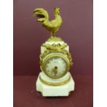 20thC French ormolu and white marble mantel clock with cockerel finial, white painted dial marked