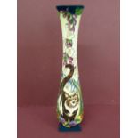 Modern Moorcroft tall slender neck vase with square top and base with decoration of flowers and cats