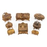 Eight French Art Nouveau Gilt Boxes , floral and scroll motifs , largest h. 5 in., w. 8 in., d. 3
