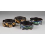 Pair of Regency Black and Gilt Japanned Papier Mache Wine Coasters , dia. 5 1/8 in.; together with a