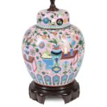 Chinese Cloisonne Enamel Covered Jar , 20th c., decorated with antiques, flowers and fruit on a pink
