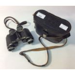 A pair of Japanese Fujigo 8 x 30 binoculars, in Russian carry case