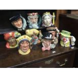Nine large Royal Doulton character jugs comprising Captain Ahab, D6500, Mad Hatter, D6598, The Red