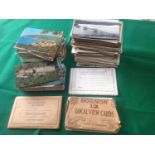 Approximately 560 postcards in a shoebox ' plus some photos, lettercards, calendar cards, three