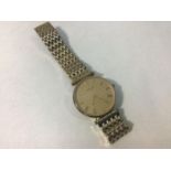A gents gold-plated Longines 'La Grande Classique de Longines' wristwatch, the textured gold dial