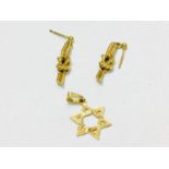 A pair of 9ct gold knot earrings, and a 9ct gold Star of David pendant, weighing a total of 3.6