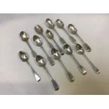 Eleven assorted Georgian and Victorian fiddle pattern silver teaspoons, including examples by