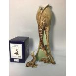 A large 20th century ceramic vase shaped as a giraffe licking her calf, by Franz, signed to base,