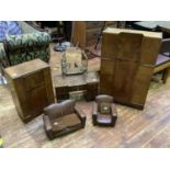 A three-piece walnut miniature bedroom suite, comprising two wardrobes and a dressing table,