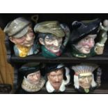 A collection of large Royal Doulton character jugs, including The Gardener, The Poacher, Tam O'