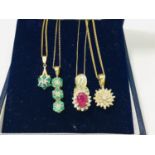 four 9ct yellow gold various gem set pendant and chains, including ruby, diamond and emerald,