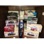 SECTION 42. A collection of 33 assorted boxed die-cast model lorries and vans including examples