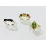 Three 9ct yellow gold various coloured stone dress rings. Total weight 9.3 grams.