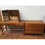 A mid-century teak dressing table by 'Loughborough', with adjustable triptych mirror to top and