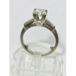 A ladies Platinum solitaire ring, set with a round brilliant cut diamond, H colour, SI clarity,