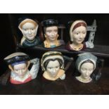 A set of six large Royal Doulton character jugs comprising The six wives of Henry VIII, Catherine of