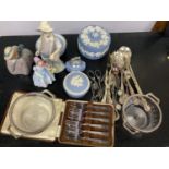 A collection of ceramics including a royal Doulton figure, NAO, Lladro, an assortment of Wedgwood,