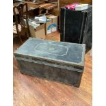 A 19th century black-painted teak trunk, with brass mounts and plaque engraved Major E. Armstrong