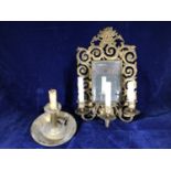An ornate gilt candle sconce with three arms and mirrored back, 40cm high, together with a brass