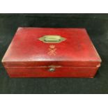 A 19th century red leather parliamentary despatch box, the top with gilt monogram, for Queen