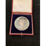 A Queen Victoria 'silver issue' commemorative Diamond Jubilee medal, 1837-1897, struck with her '