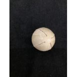 A rare stitched feathery golf ball, approximately 4.7cm diameter