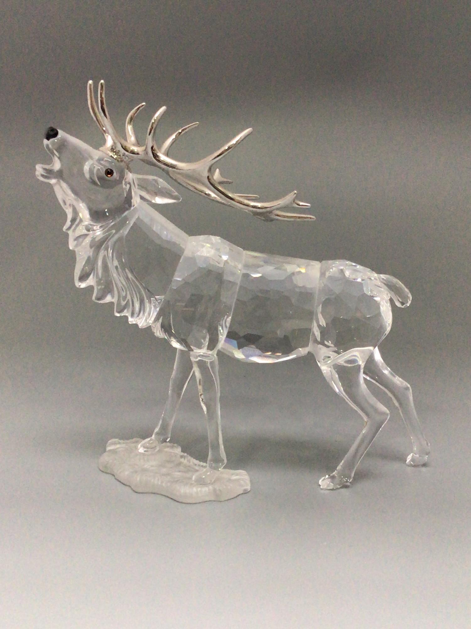 A Swarovski Crystal large figure of a Stag with silvered horns, designed by Adi Stocker, 14cm - Image 2 of 5