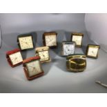 A collection of nine assorted travel clocks including examples by Bucherer, Cyma and Smiths etc.