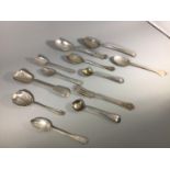 A small collection of silver spoons, some Georgian examples, one Victorian example by John Stone,