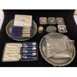A collection of assorted silver-plated items comprising two salvers, one by Mappin & Webb, a hand-