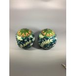 A pair of Royal Bonn Old Dutch vases with Blue leaf design and green and yellow tops, 10 x 10cm