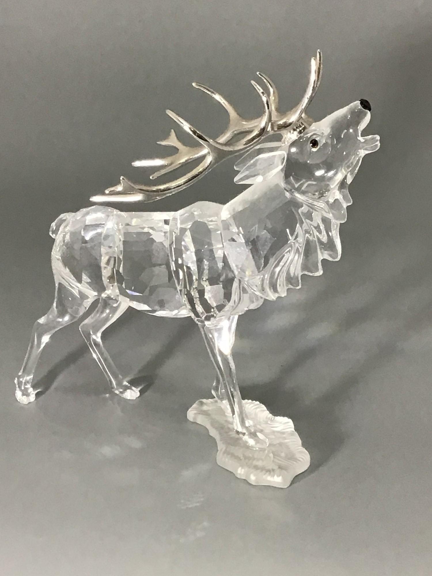 A Swarovski Crystal large figure of a Stag with silvered horns, designed by Adi Stocker, 14cm - Image 4 of 5