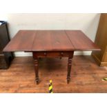A 20th century stained mahogany Pembroke table with turned supports, approx. 143cm total width x