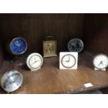 A collection of seven assorted vintage alarm clocks including a Presta Saturn, a SWIZA 8 and a