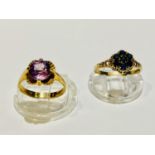A 9ct yellow gold dress ring set with a round faceted cut amethyst in a four claw setting,