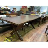 A large 20th century mahogany refectory table with X frame legs and cross stretcher, top made from 3