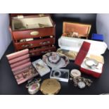 A quantity of costume jewellery and watches including some silver charms etc.