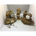 Two various French figural gilt metal mantel clocks, one with blue floral enamel painted dial on