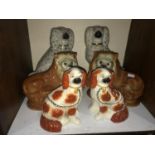 SECTION 10. Three various pairs of Staffordshire pottery figures including two pairs of Spaniels and
