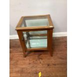 A bijouterie display cabinet/table with mirrored base and glass shelf and top 48cm wide 53cm deep