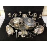 A small quantity of mixed silver-plated hollowware comprising a pair of candelabra, a pierced shaped