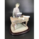 A Lladro porcelain figure of a young man at a piano 'Young Beethoven No.01815', limited edition