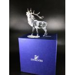 A Swarovski Crystal large figure of a Stag with silvered horns, designed by Adi Stocker, 14cm