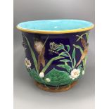 A 19th century Majolica pottery jardiniere, probably by George Jones, decorated in relief with birds