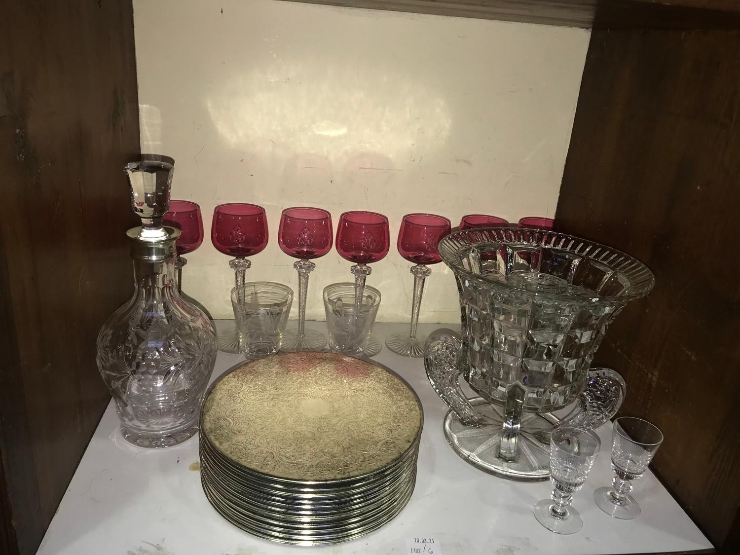 SECTION 6. A set of seven cranberry wine glasses with etched initial 'L', raised on ribbed